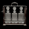 Wooden tantalus with key, 3 Square cut crystal decanters, GB