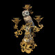 A pair of candelabras with porcelain owl and gilt-bronze vine