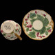 Majolica ivory and red fruits cup and saucer "George Sand"