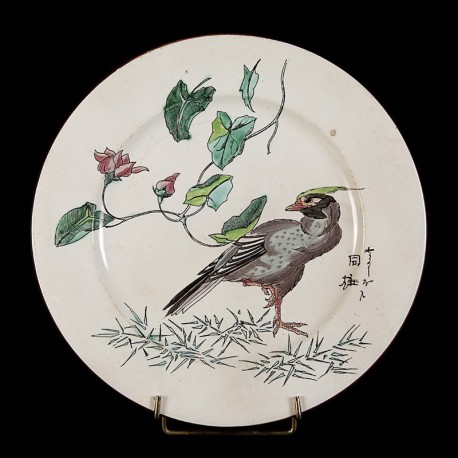 Oiseau gris sur une patte & Rosier assiette D